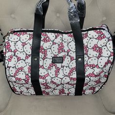 This Is A Brand New Hello Kitty Travel Bag With Extended Handle And Wheels If Needed. This Is Heavy Duty Quality Made With Carry Strap Or Carry On. It Measurements Are 12 Inch Height, 20 Inches Long And 11 Inches Wide. Get It While You Can. Won't Last! Travel Rectangular Bag With Hello Kitty Print, Trendy Hello Kitty Print Bag For Everyday Use, Trendy Hello Kitty Everyday Bag, Rectangular Hello Kitty Shoulder Bag For Travel, Hello Kitty Print Travel Shoulder Bag, White Hello Kitty Print Bag, White Hello Kitty Print Shopping Bag, White Hello Kitty Shopping Bag, Hello Kitty Print Shoulder Bag For Travel