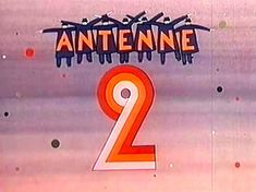 an orange and white sign that says antennene 2 is on the side of a building