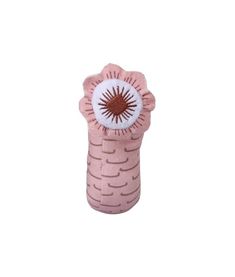 a pink and white object with an eye in it's center, on a white background