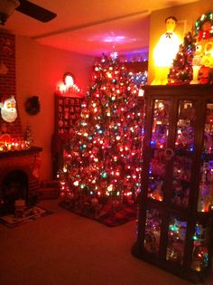 a living room decorated for christmas with lights