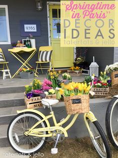 a yellow bicycle with flowers in baskets sitting on the side of a house that says springtime in paris decor ideas