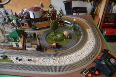 a toy train set is shown on the table