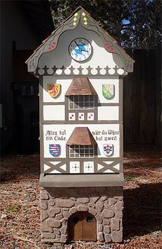 a clock tower made to look like a house