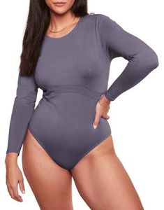 This soft knit bodysuit is made from a crepe jersey fabric that is soft and comfortable. The long-sleeve design and underbust detail provide soft shaping. The snap closure gusset makes it easy to get on and off. Long-sleeve Bodysuit 95% Viscose 5% Spandex Crepe Jersey Underbust Detail for Soft Shaping Snap Closure Gusset Long Sleeve Seamless Elastane Bodysuit, Seamless Long Sleeve Elastane Bodysuit, Long Sleeve Stretch Bodysuit With Smoothing Details, Long Sleeve Second-skin Smoothing Bodysuit, Solid Long Sleeve Seamless Bodysuit, Solid Seamless Long Sleeve Bodysuit, Long Sleeve Elastane Bodysuit For Loungewear, Seamless Second-skin Long Sleeve Bodysuit, Fall Second-skin Bodysuit With Thumbholes