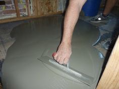 cement/concrete floor diy Concrete Floor Diy, Cement Floor Diy, Concrete Floors Diy, Inexpensive Flooring, Rustic Kitchens, Cement Floors, Mudroom Ideas, Property Brothers