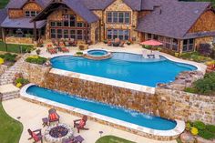 an aerial view of a home with a swimming pool