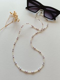 An elegant Eyeglass chain for your sunglasses or reading glasses. Approximately size of the chain is 65cm. It comes with a glasses connector that is removable. Beaded Glasses Chain, Beaded Glasses, Beaded Sunglasses, Nice Glasses, Glasses Chains, Glasses Strap, Chain For Women, Sunglass Chain, Eyeglass Chain