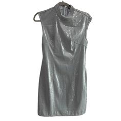 Prettylitttlethings A Touch Of Sparkle Silver Sequin Mini Figure-Hugging Fit, Product Type: Bodycon Dress Color: Silver Material: Sequin Mixture Size: 4 Neckline: High Neck Sleeves: Sleeveless Occasion: Evening / Date Night / Party Glamorous Sleeveless Lined Mini Dress, Dressy Sheath Mini Dress For Party, Stretch Knee-length Sleeveless Dress For Party, Dressy Sleeveless Sequin Dress For Party Season, Fitted Sleeveless Dress For Evening Holiday, Fitted Sleeveless Dress For Holiday Evenings, Fitted Sleeveless Dressy Dress For Party, Dressy Fitted Sleeveless Party Dress, Fitted Sequin Holiday Dress For Party