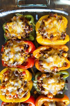 peppers stuffed with cheese and meat in a pan