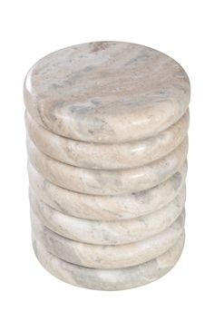 marble coasters stacked on top of each other in the shape of a circle, with white background