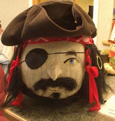 an image of a pirate's head on the computer screen with other pictures in the background