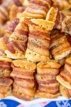 bacon wrapped cream cheese crackers stacked on top of each other with text overlay