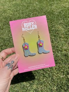 Holographic glitter cowboy boot earrings with a pink and green flower detail and gold-look findings 60s Disco, Love Core