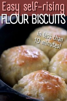 some biscuits in a pan with the words easy self - rising flour biscuits