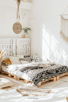 a bed made out of pallets in a room