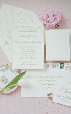 the wedding stationery is laid out and ready to be used