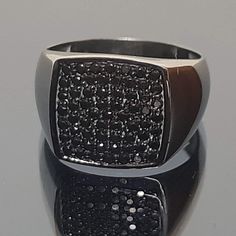 💍Amazing black diamond ring. 📜 Hand-made diamond ring in gold K9, K14 or K18. Square TV top set with black diamonds or black spine if you prefer lower cost with the same look.  A black-plated pattern all over the ring gives a sophisticated character to the ring. Choose it for you .. you're worth it. Ideal gift for your loved person also. ✍ Designed and created by Babuco Athens. ♻A recycled piece. ⚖ Ring's weight: In K9 7,5grm, in K14 8,5grm and in K18 9,5grm approxemently. 📐Top Dimensions: 15X15mm. 💎Gems certificate available. 🎁Gift box included. 😊Thank you for stopping by. Modern Formal Rings With Black Diamonds, Black Stainless Steel Signet Promise Ring, Modern Silver Cluster Ring, Modern Black Spinel Rings For Gift, Modern Black Spinel Rings For Gifts, Modern Black Spinel Rings As Gift, Modern Black Diamond Round Rings, Luxury Black Cubic Zirconia Rings, Modern Rectangular Cubic Zirconia Rings