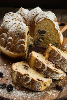 a loaf of bread with raisins and powdered sugar