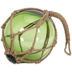 a green glass ball with rope wrapped around it