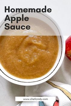 homemade apple sauce in a white bowl with an apple next to it and the title overlay reads homemade apple sauce