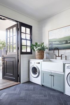 a washer and dryer in a small room