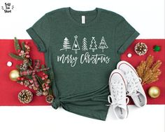 "🎄Merry Christmas Trees Shirt, Christmas Trees Shirt, Christmas Shirt, Holiday Shirt, Merry Christmas Trees Tee, Merry Christmas Tee 🎄 We use a high-quality unisex Jersey Bella+Canvas 3001 Short Sleeve Tee. HOW TO ORDER? Please, check and review all photos; 👕 Choose your T-Shirt size and design color of the T-Shirt; 🛒 Click \"Add to cart\". You can go back to add more products; 💵 Click \"Proceed to checkout\" or \"Pay with PayPal\" (you can pay at PayPal without a PayPal account); 📦 Your o Ladies Christmas Shirts, Funny Santa Shirts, Cute Christmas Shirt, Buffalo Plaid Shirt, Cute Christmas Shirts, Womens Christmas Shirts, New Years Shirts, Christmas Tree Shirt, Plaid Shirts