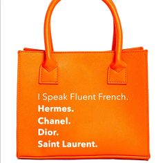 Orange, I Speak Fluent French Handbag Product Details: 100% Vegan Leather Magnetic Clasp Dimensions: 7.5” X 9.5” X 3.0” Handles: 5.5” Wide X 4.5” High Removable Strap Trendy Orange Satchel, Orange Tote Shopping Bag, Modern Orange Bag With Top Carry Handle, Orange Tote Bag For Shopping, Orange Shopping Bag With Top Carry Handle, Orange Shoulder Bag With Top Handle For Shopping, Orange Shoulder Bag With Top Carry Handle For Shopping, Trendy Orange Shopping Bag, Trendy Orange Bag For Shopping