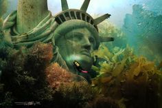 the statue of liberty is surrounded by corals and seaweed in this underwater photo