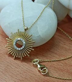 Sun diamond necklace MATERİAL: yellow Gold Gold weight: 4.00 Gr Diamond: 0.13 ct. G. V/S S/l Solid gold 14k Yellow Gold Sun Design Necklace, 14k Gold Sun Design Necklaces, Sunburst Necklace Gold, Gold Sun-shaped Necklace Gift, Elegant Sun Design Pendant Necklace, Necklace Sun, Sun Burst, Sun Necklace, Necklace For Her