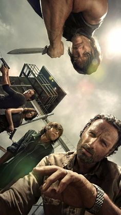 the walking dead season 3 poster with three men standing in front of an overcast sky