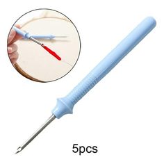 the needle has been inserted into the hole in the medical instrument, and it is blue