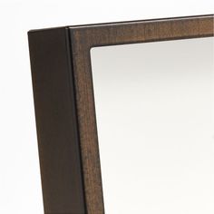 a mirror that is sitting on top of a table