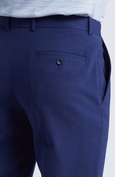 Smart and versatile, these dress pants tailored from polished wool feature a touch of stretch to keep you moving comfortably at any formal occasion. 36 1/2" inseam; 15" leg opening; 9 1/2" front rise; 15" back rise (size 30) Zip fly with hook-and-bar closure Front slant pockets 96% wool, 4% elastane Dry clean Imported Solid Wool Dress Pants For Work, Formal Solid Wool Dress Pants, Formal Wool Dress Pants In Solid Color, Blue Wool Dress Pants For Work, Tailored Solid Wool Dress Pants, Tailored Wool Dress Pants, Semi-formal Tailored Solid Dress Pants, Tailored Solid Dress Pants For Semi-formal Occasions, Fitted Wool Bottoms In Solid Color