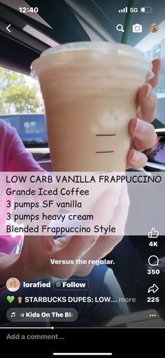 a person holding a cup in their hand while sitting in a car with the text low car vanilla frappuccino on it