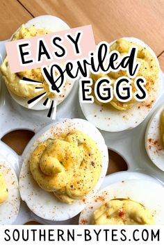 deviled eggs with butter and seasoning in them on a white platter text overlay says easy deviled eggs