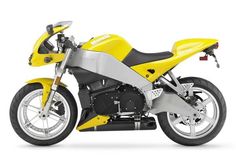 a yellow and black motorcycle is shown on a white background