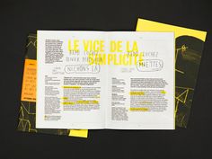 an open brochure with yellow and black designs on it's front page