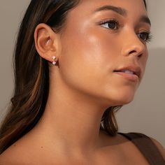 Our Spotlight Earrings are the perfect balance of simple and eye-catching. Featuring two circular stones, one as a stud and one as a dangle, these gold earrings put all eyes on you. Timeless Rose Gold Earrings, Timeless Drop Earrings For Everyday, Timeless Pearl Drop Earrings, Modern Rose Gold Cartilage Earrings, Pearl Drop Crystal Earrings As A Gift, Crystal Earrings With Pearl Drop For Gift, Pearl Drop Crystal Earrings For Gift, Minimalist Dangle Pearl Earrings, Gold Pearl Drop Cartilage Earrings