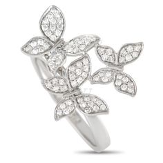 This charming ring is truly breathtaking to behold. Accented by diamonds totaling 0.30 carats, it features a trio of butterflies perched atop a 2mm wide band. A 3mm top height makes this a wearable piece you x2019 ll want to show off as often as possible. xD xD This jewelry piece is offered in brand new condition and includes a gift box. xD Diamond Butterfly Ring, Diamond Butterfly, Gold Models, Butterfly Ring, Wide Bands, Metal Stamping, Watch Brands, Types Of Metal, Jewelry Pieces