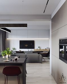 an open kitchen and living room with modern furnishings