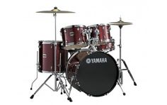 a red drum set sitting on top of a white background