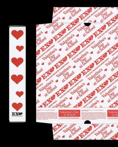 valentine's day playing cards with hearts on the front and back, both in red