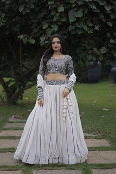 💃 ELEGANT LEHENGA CHOLI 👗 Indulge in the allure of our Cream-Colored Georgette Lehenga Choli with exquisite sequin work - perfect for your next festive soirée. Lehenga: (Fully Stitched) Fabric & Embellishments: Faux Georgette with Sequins Embroidery  Length: 42'', Waist: 42''  Inner Lining: Cotton, Flair: 3.5 M  Closure: Chain Attached & Dori Latkan  Stitching: Expertly stitched with Canvas & Can-Can. Blouse: (Unstitched) 👉 Fabric & Embellishments: Faux Georgette with Sequins Embroidery 👉 Size: 1 M Dupatta: 👉 Fabric & Design: Faux Georgette with Lace Border 👉 Length: 2.3 M 👉 Weight: 1.600 kg  Elevate your style with this meticulously crafted ensemble, designed to make you shine at every celebration. White Wedding Lehenga, Elegant Lehenga, Top Lehenga, Stylish Lehenga, White Lehenga, Sabyasachi Lehenga, Fabric Work, Blouse Designer, Bad Fashion