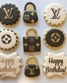 decorated cookies with the words happy birthday written in gold and black frosting on them