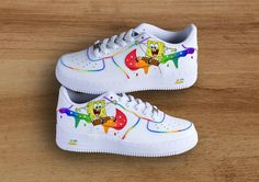 Air Force 1 'Rainbow' color drip custom sneakers Step into a world that combines cartoon and Pride with our hand-painted rainbow Spongebob Air Force 1 sneakers. These sneakers are a must-have for every SpongeBob fan and sneaker enthusiast looking for something truly special. These sneakers are especially popular among women! They offer a unique and beautiful touch to any wardrobe! And they are easy to combine with your favorite jeans. ★ Each sneaker is unique, completely new and passionately han Angelus Paint, Spongebob Cartoon, Air Force 1 Sneakers, Custom Painted Shoes, Rainbow Sneakers, Rainbow Shoes, Painted Rainbow, Custom Nike Shoes, Air Force 1 Custom