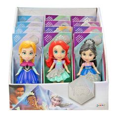 the disney princess figurines are in their boxes