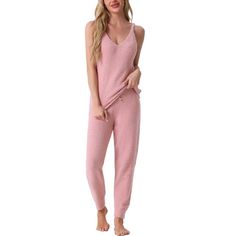 These fluffy plush pyjama sets are the perfect combination of comfort and style. These sets typically include a cami top paired with long pants. The fluffy fabric is warm thick and breathable, ensuring that the pajama sets are cozy and soft on the skin, keeping warm and comfortable all night in fall and winter. The cami and joggers design adds a feminine and lovely touch to the sets, making them perfect for women who want to feel comfortable but also look pretty while they sleep. The elastic wai Pink Stretch Sleeveless Sleepwear, Comfortable Pink Winter Sleepwear, Pink Soft Winter Sleepwear, Stretch Sleepwear For Bedtime, Short Length, Winter Sleepwear For Relaxation, Super Soft, Satin Button Down Shirt, Silky Pajamas, Family Pajama Sets, Flannel Pajama Sets