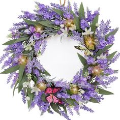 a wreath with purple flowers and butterflies