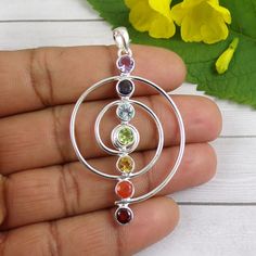 Amethyst, Iolite, Blue Topaz, Citrine, Peridot, Carnelian, Garnet Pendant, 925 Silver Pendant, Mothers Gift, Huge Shape Pendant, N010316 Metal - Solid 925 Sterling Silver Gemstone - Amethyst, Iolite, Blue Topaz, Citrine, Carnelian, Peridot Stone Size- 5mm Main Color: Multi  Weight: 8.5gram  You can use it your self or Gift it to someone. It is an ideal gift which everyone would love to get. If you want extra small or extra large let me know. We will make it specially for you. Brought to you excl Multicolor Round Fusion Gemstones, Fusion Style Multicolor Round Gemstones, Spiritual Multi-stone Oval Gemstones, Round Multi-stone Gemstones For Gift, Spiritual Silver Birthstone Gemstones, Round Multi-stone Sterling Silver Gemstones, Round Multi-stone Gemstones In Sterling Silver, Spiritual Round Birthstone Gemstones, Fusion Style Oval Sterling Silver Gemstones