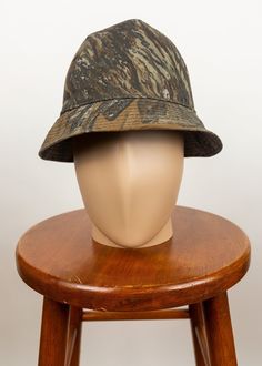 "For sale is a vintage hat. Insulated crown, stiff brim. Ear flap can be worn down. Good condition. Tagged size medium. Measured circumference of 21\", a little small." Brown Military Hat With Curved Brim, Adjustable Military Bucket Hat, Military Style Brown Hat With Curved Brim, Vintage Wide Brim Adjustable Baseball Cap, Vintage Adjustable Wide Brim Baseball Cap, Vintage Wide Brim Sun Hat For Outdoor, Adjustable Pre-washed Bucket Hat, Vintage Sun Hat With Short Brim For Outdoor, Vintage Brown Bucket Hat One Size